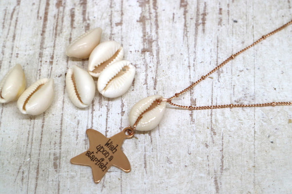 Load image into Gallery viewer, Rose gold cowrie shell and wish upon a starfish pendant necklace
